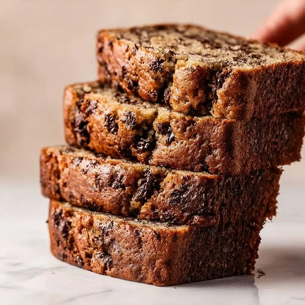 Delicious slice of best ever chocolate chip banana bread on a plate