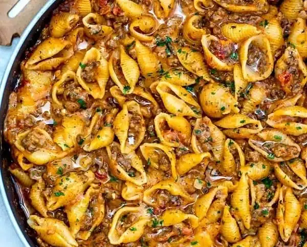 Creamy beef and shells dish with pasta and ground beef
