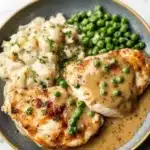Creamy Boursin Chicken Bake with herbs and cheese, fresh out of the oven