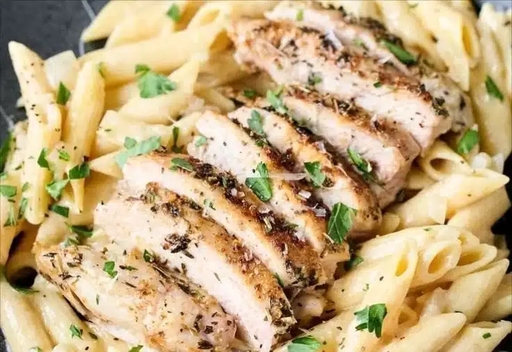 Creamy Garlic Parmesan Chicken Pasta garnished with parsley