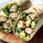 Grilled Chicken Caesar Salad Wrap with fresh ingredients and dressing