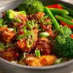 Healthy Sticky Chicken Bowl with colorful veggies and tender chicken