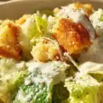 Homemade Caesar salad dressing made without raw anchovies in a bowl.