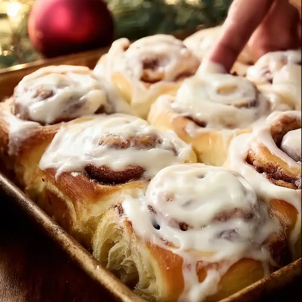 Delicious jumbo cinnamon rolls with creamy icing, inspired by Cinnabon.