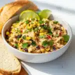 Colorful Southwest Chicken Salad topped with grilled chicken and fresh veggies