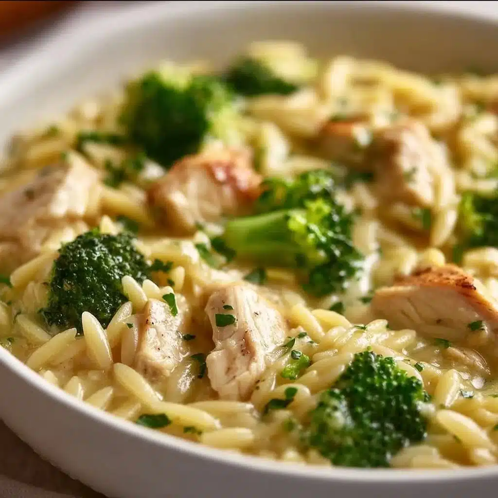 Bowl of Healthy Chicken Broccoli Orzo with fresh vegetables