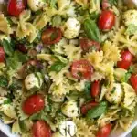 Colorful Bow Tie Pasta Salad with vegetables and dressing