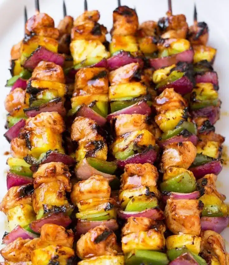 Delicious Hawaiian Chicken Kebabs with colorful vegetables and pineapple.