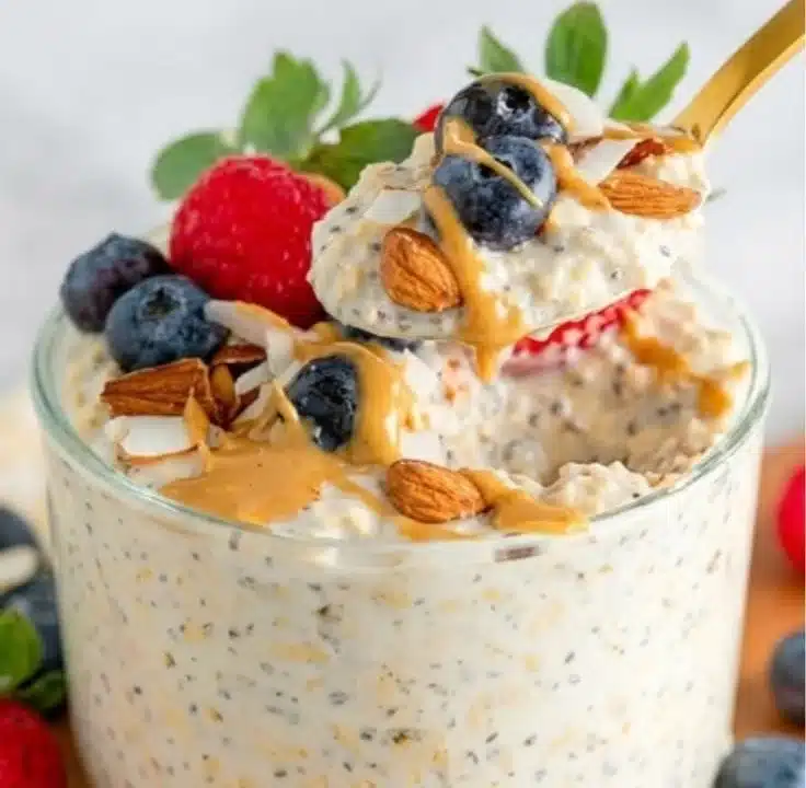 High protein overnight oats topped with fruits and nuts for a nutritious breakfast