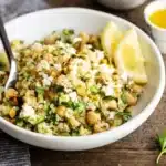 A colorful bowl of Jennifer Aniston Salad with fresh ingredients and healthy toppings